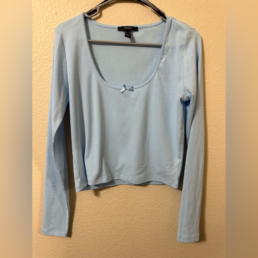 Forever 21 powder blue top in excellent condition.